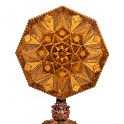An octagonal indigenous specimen wood marquetry table