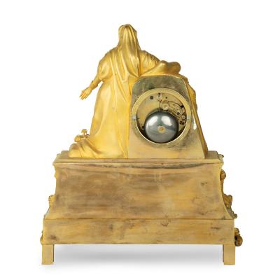 An ormolu mantel clock with Queen Victoria in medieval dress by Monroux 1832