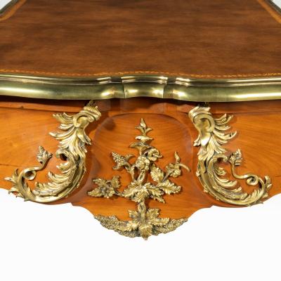 An outstanding Louis XV style mahogany bureau plat