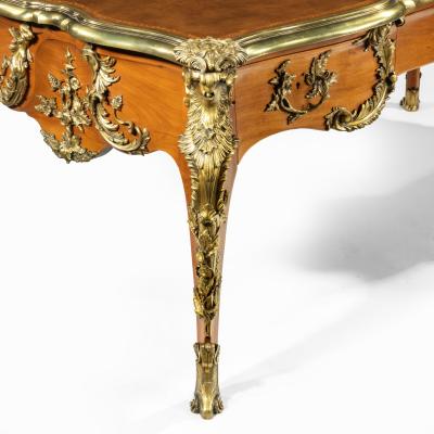 An outstanding Louis XV style mahogany bureau plat