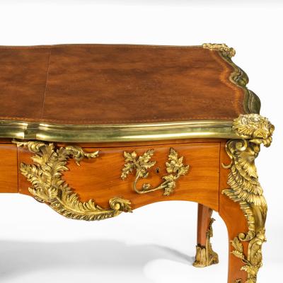An outstanding Louis XV style mahogany bureau plat