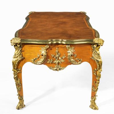 An outstanding Louis XV style mahogany bureau plat