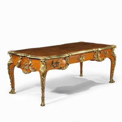 An outstanding Louis XV style mahogany bureau plat