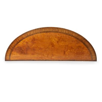 An unusual George III satinwood side table