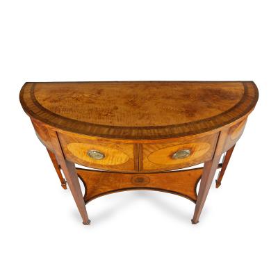 An unusual George III satinwood side table