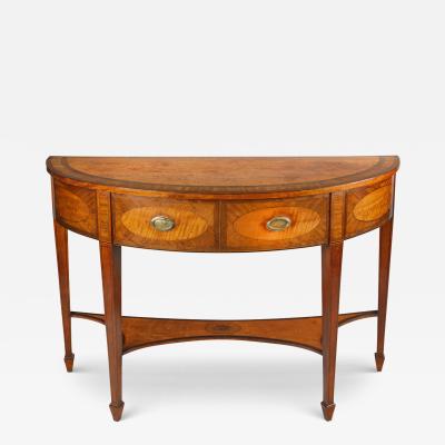 An unusual George III satinwood side table