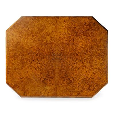 An unusual William IV amboyna and oak four drawer library table by Simpson