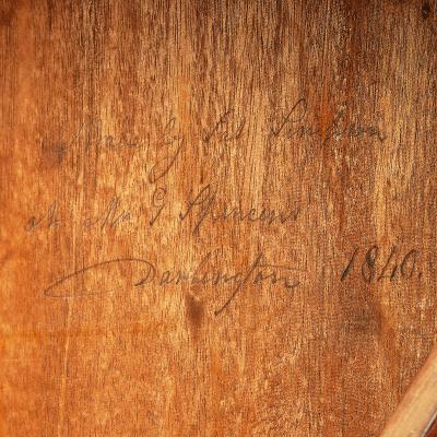 An unusual William IV amboyna and oak four drawer library table by Simpson