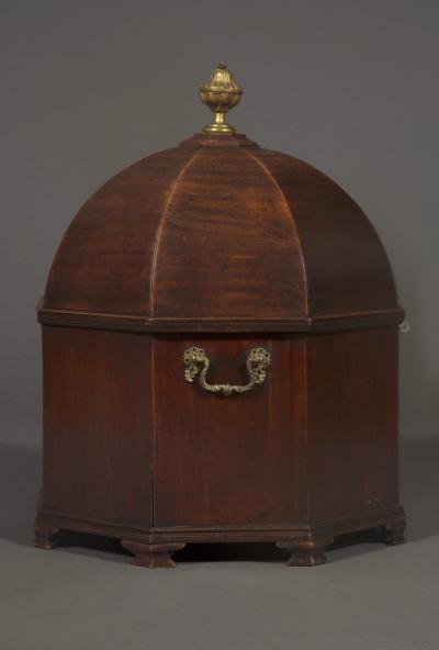 An unusual early george III Mahogany cellarette of octagonal dome