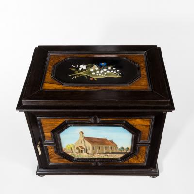An unusual ebony bijouterie table cabinet