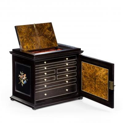 An unusual ebony bijouterie table cabinet