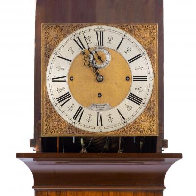 An unusual flame mahogany long case clock attributed to Maples