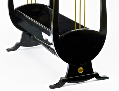 Andr Arbus Andre Arbus pair of harp shaped black lacquered and gold accent side table