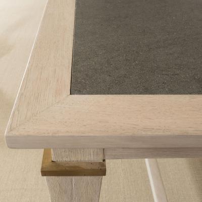 Andr Arbus LARGE TABLE BY ANDRE ARBUS IN CERUSED OAK W STONE TOP AND BRONZE DETAILS