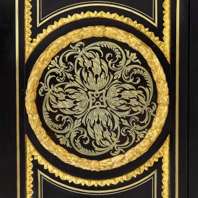 Andr Charles Boulle Brass and tortoiseshell inlaid Boulle style ebonised wood cabinets