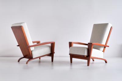 Andr Sornay Pair of Andr Sornay Armchairs in Sapele Mahogany and Boucl France 1950s
