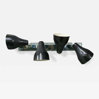 Angelo Ostuni Angelo Ostuni Wall Lamp Black MidCentury for Oluce in brass and glass 1960s