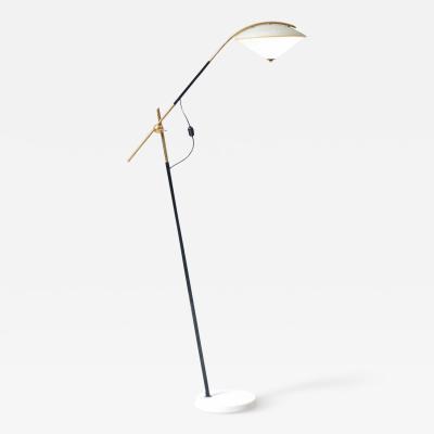 Angelo Ostuni Elegant floor lamp with adjustable arm metal and glass