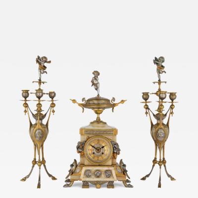 Antique Alabaster Ormolu and Silvered Bronze Clock Set in the Neo Grec Style