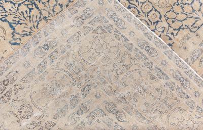 Antique Blue and Beige Persian Kirman Handwoven Wool Rug