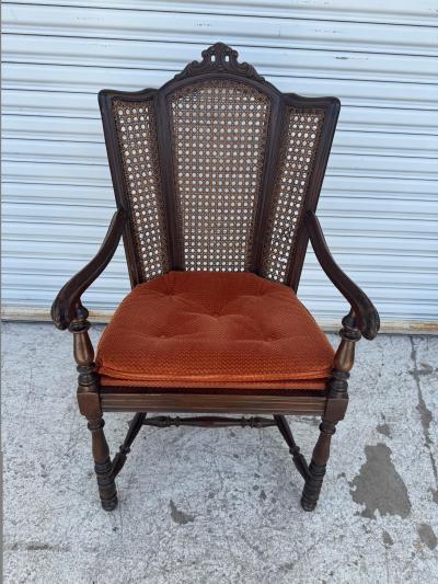 Antique Carved Wood Armchair with Cane Back