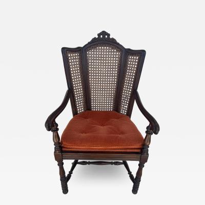 Antique Carved Wood Armchair with Cane Back