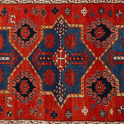 Antique Caucasian hand woven wool rug