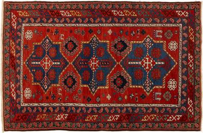 Antique Caucasian hand woven wool rug