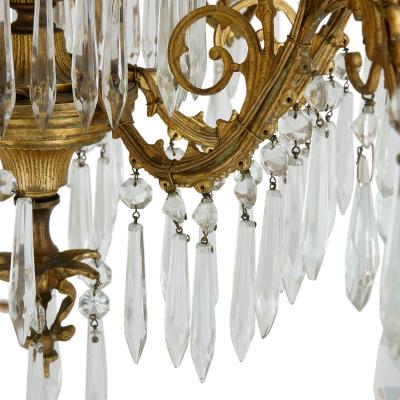 Antique French clear cut glass and ormolu twelve light chandelier