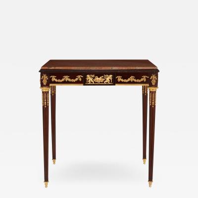 Antique French gilt bronze mounted mahogany side table