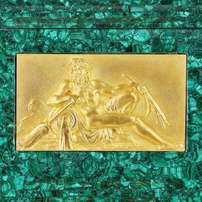 Antique French gilt bronze mounted malachite turning mantel clock