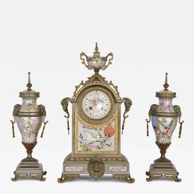 Antique French porcelain gilt and silvered brass clock set