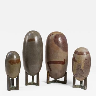 Antique Hand Polished Lingam Stone Sculptures with Bronze Stands Set of 4