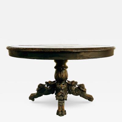 Antique Heavily Carved Griffins Wood Center Game Table on Casters