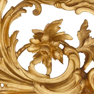 Antique Italian giltwood mirror in the Rococo style