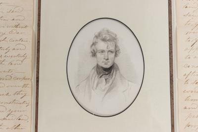 Antique Letters with Central Oval Portrait in a Wooden Frame