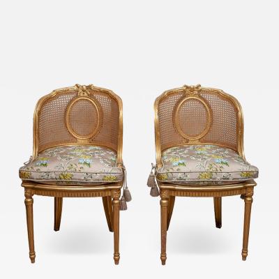 Antique Pair of French Gilded Chairs with Cane Webbing and Upholstered Cushions
