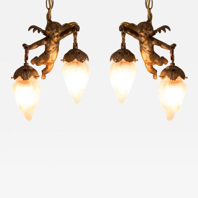 Antique Pair of French Gold Bronze and Glass Cherub Pendant Lights