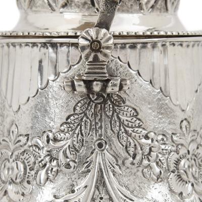 Antique Swedish repouss and engraved silver teapot