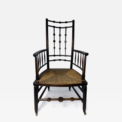 Antique Victorian Spindle Back Armchair with Woven Rush Seat Casters