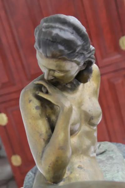 Antique bronze sculpture reclining woman