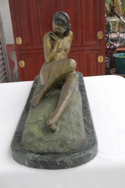 Antique bronze sculpture reclining woman