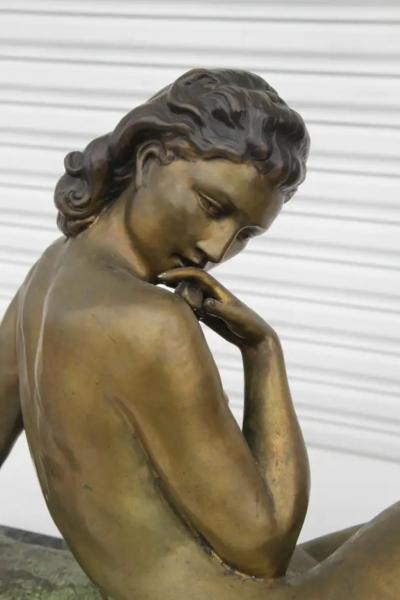 Antique bronze sculpture reclining woman
