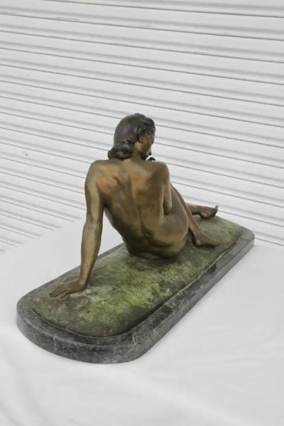 Antique bronze sculpture reclining woman