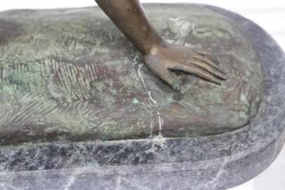 Antique bronze sculpture reclining woman