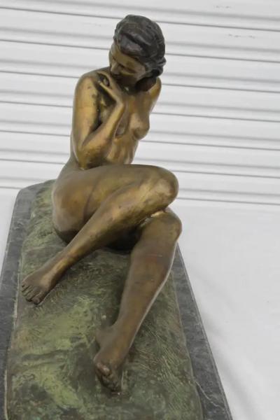 Antique bronze sculpture reclining woman