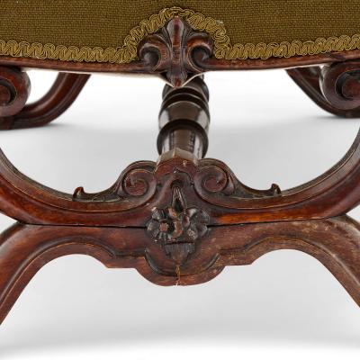 Antique carved hardwood and upholstered Victorian stool