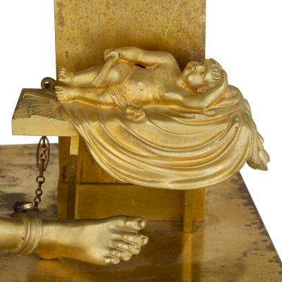 Antique early 19th century Empire style gilt and patinated bronze mantel clock