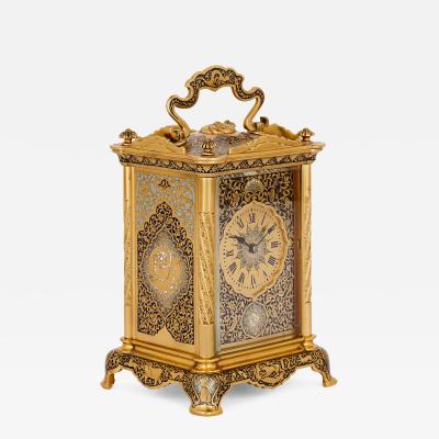 Antique enamelled gilt bronze carriage clock