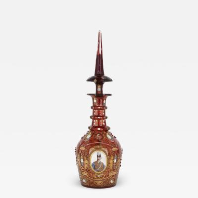 Antique gilt and enamelled ruby red glass decanter